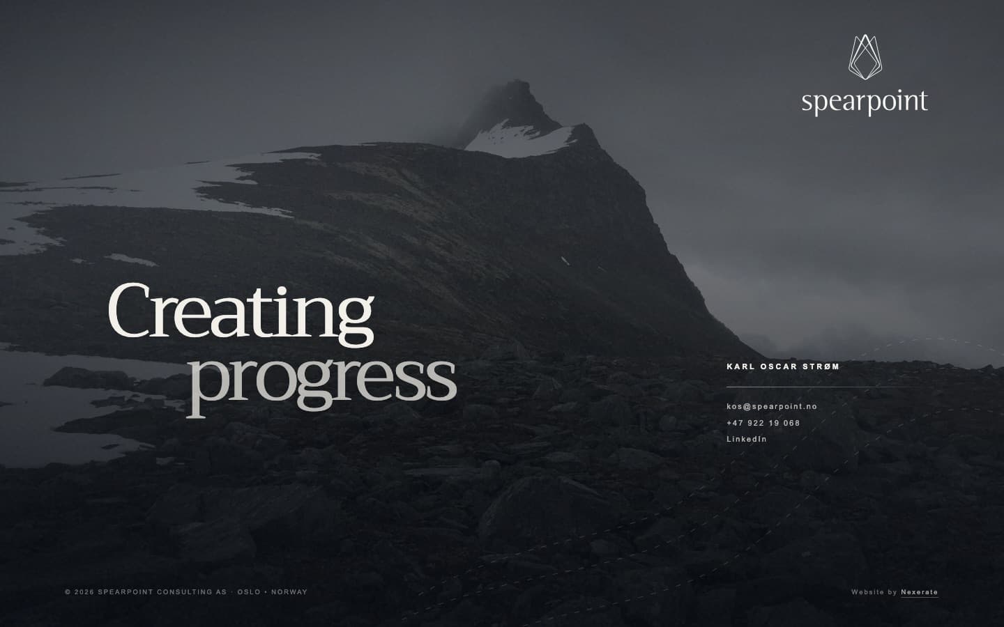 Front page of Spearpoint's website, with a monochrome mountain and Creating progress headline